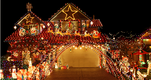House exterior covered in Christmas lights